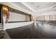 Large community stage with brick wall and dark hardwood floor at 274 Tupelo Lake Dr, Summerville, SC 29486