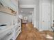 Bright entryway with hardwood floors and white console table at 274 Tupelo Lake Dr, Summerville, SC 29486