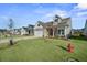 Houses with green lawns and a fire hydrant visible at 274 Tupelo Lake Dr, Summerville, SC 29486
