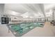 Indoor lap pool with large windows and a bright atmosphere at 274 Tupelo Lake Dr, Summerville, SC 29486