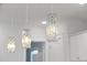 Crystal pendant lights add a touch of elegance to this kitchen at 274 Tupelo Lake Dr, Summerville, SC 29486