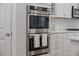 Double oven with modern stainless steel finish and ample cooking space at 274 Tupelo Lake Dr, Summerville, SC 29486