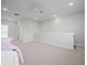 Spacious loft area with carpeted floor and ceiling fan at 274 Tupelo Lake Dr, Summerville, SC 29486