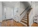 Wooden staircase with white risers and railing at 274 Tupelo Lake Dr, Summerville, SC 29486