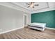 Bedroom with green accent wall and ceiling fan at 327 Great Lawn Dr, Summerville, SC 29486