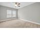 Spacious bedroom with wall-to-wall carpet and ceiling fan at 327 Great Lawn Dr, Summerville, SC 29486