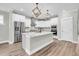 Modern kitchen with stainless steel appliances and an island at 327 Great Lawn Dr, Summerville, SC 29486
