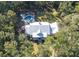 House with metal roof, pool, and large lot surrounded by trees at 3365 Westphal Dr, Johns Island, SC 29455