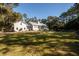 Spacious backyard with expansive lawn, providing ample outdoor space at 3365 Westphal Dr, Johns Island, SC 29455