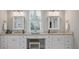 Double vanity bathroom with granite countertops, plenty of storage, and natural light at 3365 Westphal Dr, Johns Island, SC 29455