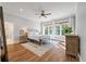 Main bedroom with king-size bed, hardwood floors, and large windows at 3365 Westphal Dr, Johns Island, SC 29455