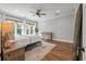 Spacious bedroom with king-size bed, hardwood floors, and ample natural light at 3365 Westphal Dr, Johns Island, SC 29455