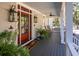 Inviting front porch with rocking chairs and planters at 3365 Westphal Dr, Johns Island, SC 29455