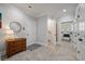 Bright hallway with tile floors, leading to laundry and additional rooms at 3365 Westphal Dr, Johns Island, SC 29455