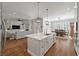 Island kitchen with white cabinets and granite countertops at 3365 Westphal Dr, Johns Island, SC 29455