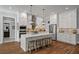 Spacious kitchen with white cabinets, island, and stainless steel appliances at 3365 Westphal Dr, Johns Island, SC 29455