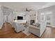 Spacious living room with fireplace and built-in shelving at 3365 Westphal Dr, Johns Island, SC 29455