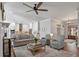 Open concept living room with kitchen and cozy seating at 3365 Westphal Dr, Johns Island, SC 29455