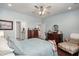 Spacious bedroom with hardwood floors and access to bathroom at 487 Switchgrass Dr, Summerville, SC 29486