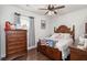 Charming bedroom with wooden furniture and large window at 487 Switchgrass Dr, Summerville, SC 29486
