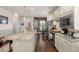 Modern kitchen with granite countertops and stainless steel appliances at 487 Switchgrass Dr, Summerville, SC 29486