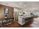 Modern kitchen with island, stainless steel appliances, and hardwood floors at 487 Switchgrass Dr, Summerville, SC 29486