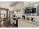 Modern kitchen featuring stainless steel appliances and granite countertops at 487 Switchgrass Dr, Summerville, SC 29486