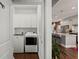 Convenient laundry room with washer, dryer, and cabinets at 487 Switchgrass Dr, Summerville, SC 29486