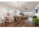 Comfortable living room featuring hardwood floors and access to a patio at 487 Switchgrass Dr, Summerville, SC 29486