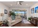 Cozy living room with hardwood floors and view of community at 487 Switchgrass Dr, Summerville, SC 29486