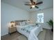 Bedroom with ceiling fan, window, and a cozy bed with bedding at 523 Truman Dr, Goose Creek, SC 29445