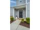 Gray two-story home with black front door and landscaping at 523 Truman Dr, Goose Creek, SC 29445