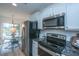 Eat-in kitchen with stainless steel appliances and granite counters at 523 Truman Dr, Goose Creek, SC 29445