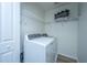 Laundry room with washer, dryer, and shelving for storage at 523 Truman Dr, Goose Creek, SC 29445