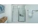 Glass enclosed shower with tile surround and built-in shelf at 523 Truman Dr, Goose Creek, SC 29445