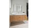 Modern bathroom with floating double vanity and sleek wood cabinets at 58 Grand Pavilion Blvd, Isle of Palms, SC 29451