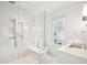 Modern bathroom with a large walk-in shower and marble tile at 58 Grand Pavilion Blvd, Isle of Palms, SC 29451