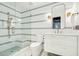 Stylish bathroom with blue and white tile and a walk-in shower at 58 Grand Pavilion Blvd, Isle of Palms, SC 29451