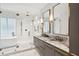 Luxurious bathroom with marble finishes, a soaking tub, and a walk-in shower at 58 Grand Pavilion Blvd, Isle of Palms, SC 29451