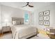 Serene bedroom with light walls, a queen bed, and a ceiling fan at 58 Grand Pavilion Blvd, Isle of Palms, SC 29451