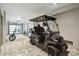 Garage with golf cart, ebike and motorcycle at 58 Grand Pavilion Blvd, Isle of Palms, SC 29451
