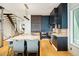 Modern kitchen with marble island and dark cabinetry at 58 Grand Pavilion Blvd, Isle of Palms, SC 29451