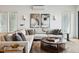 Spacious living room with sectional sofa and ocean view at 58 Grand Pavilion Blvd, Isle of Palms, SC 29451