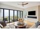 Living area with fireplace and ocean view at 58 Grand Pavilion Blvd, Isle of Palms, SC 29451