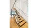 Modern floating staircase with glass and wood features at 58 Grand Pavilion Blvd, Isle of Palms, SC 29451