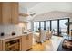 Wet bar with wood cabinets, beverage cooler and ocean views at 58 Grand Pavilion Blvd, Isle of Palms, SC 29451