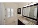 Well-appointed bathroom featuring granite countertop and updated vanity at 8245 Governors Walk, North Charleston, SC 29418