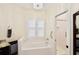 Elegant bathroom with soaking tub, walk-in shower, and updated fixtures at 8245 Governors Walk, North Charleston, SC 29418