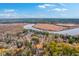 Aerial view of community near a river, showcasing multiple buildings at 8382 Camp Gregg Ln, North Charleston, SC 29418