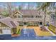 Aerial view of a two-story home with attached garages and landscaping at 8382 Camp Gregg Ln, North Charleston, SC 29418